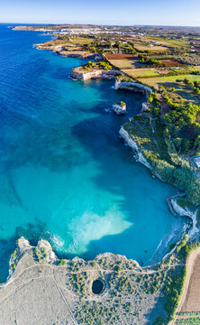 Aerial view of the open grotto known as Grotta Sfondata on cliffs along the coastline, Otranto, Lecce, Salento, Apulia, Italy