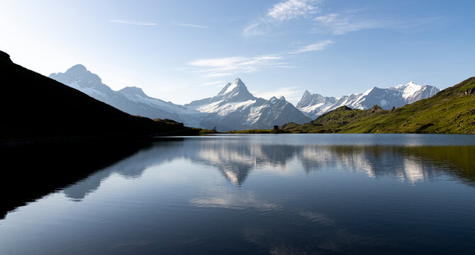 Schreckhorn mountain reflected in Bachalpsee lake at dawn, Grindelwald, Bernese Oberland, Bern Canton, Switzerland