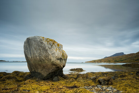 Large rock at low tide, west Senja, Norway, Scandinavia