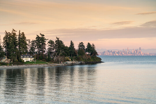 Bainbridge Island at sunset, with Seattle cityscape in the background, Seattle, Kitsap county, Washington State, United States of America