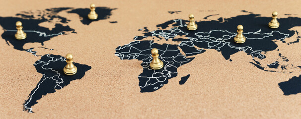 concept of geopolitics or worldwide economy. chess figures placed on map banner