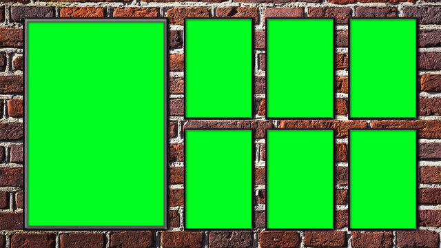 Green screen photo frames on a brick wall - copy space
