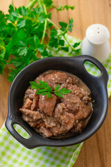 Lamb stew with red wine gravy, carrots and onions