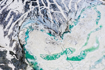 Aerial zenithal view of abstract details of Fellaria glacier, Valmalenco, Valtellina, Sondrio province, Lombardy, Italy