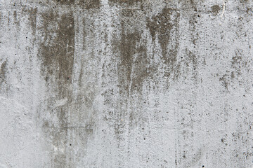 Large gray old concrete wall, weathered by age. Backgrounds.