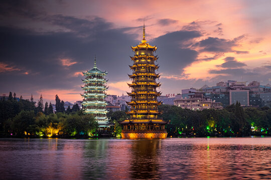 Sun and Moon pagodas at sunset in Guilin, Guilin, Guangxi, China