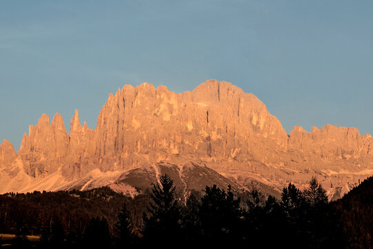 Orange sunset named enrosadira on Catinaccio mountain, Val di Tires, Bolzano, Italy