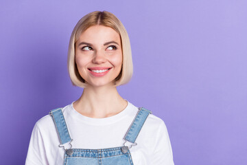 Photo of nice optimistic short hairdo blond lady look empty space wear white t-shirt isolated on...