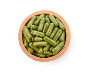 Moringa capsule pills on white background