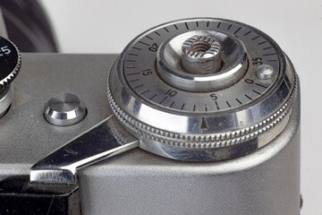 Controls of an old film SLR camera. Close-up. Soft focus