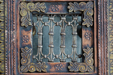 Beautiful antique indian furniture. Old wooden pattern texture. Vintage furniture with ornament.