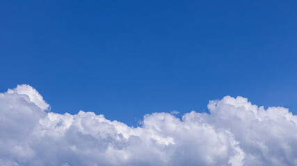 Naklejka na ściany i meble White cloud with blue sky background
