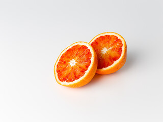 Red blood orange fruit with slices isolated on white background. Whole ripe juicy Sicilian Blood...