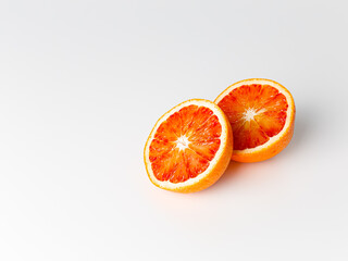 Red blood orange fruit with slices isolated on white background. Whole ripe juicy Sicilian Blood...