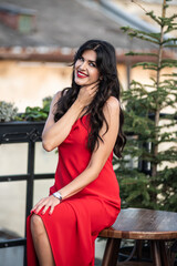 Woman in red dress outdoor