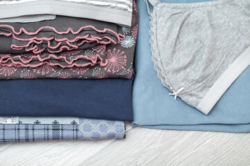 Women's casual underwear, stacked in piles. Home Cotton Clothing