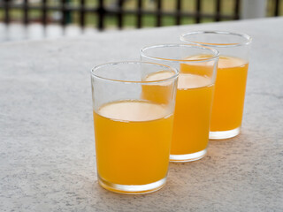 Fresh orange juice in a glass is ready to serve for breakfast.