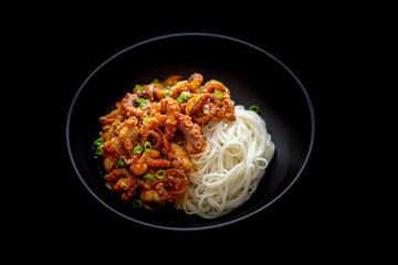 Spicy Squid Stir Fry which is called Ojingeo Bokkeum with thin white noodle
