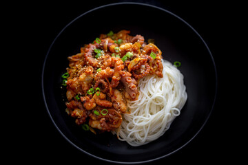 Spicy Squid Stir Fry which is called Ojingeo Bokkeum with thin white noodle