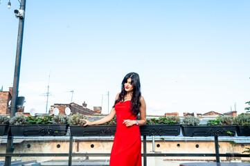 Woman wearing red dress outdoor