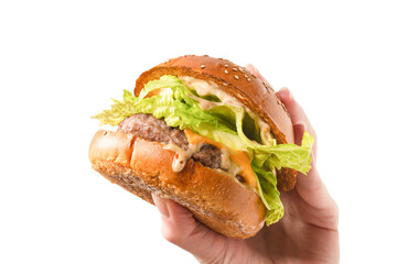 Hamburger in woman hands isolated on a white background.