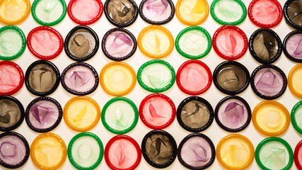 Colorful condoms background.