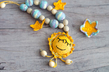 Knitted toy for develop of newborn baby's motility