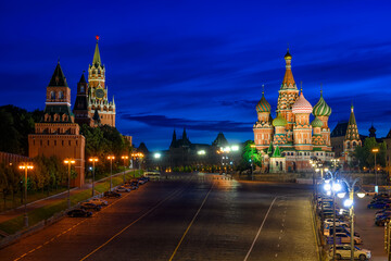 Fototapeta na wymiar Saint Basil's Cathedral, Spasskaya Tower and Red Square in Moscow, Russia. Architecture and landmarks of Moscow. Night cityscape of Moscow Kremlin