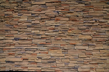 Old stone wall texture background for design and decoration.