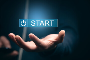 man holding phone with start icon