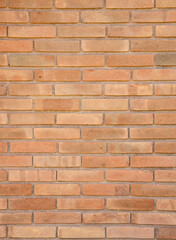 Fototapeta premium Orange clay bricks wall background. Bricks backdrop