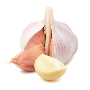 Garlic bulb and peeled cloves isolated on white background