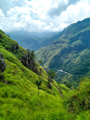 Fototapeta na wymiar Incredible green views of mini Adams Peak valley in Sri Lanka, south east asia.