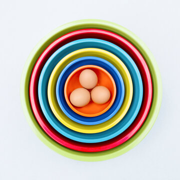 Eggs In Colorful Nesting Bowls