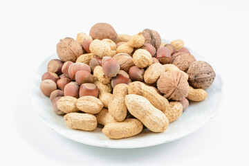 Blend nuts on plate. Concept of healthy and proper nutrition.