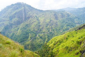 Fototapeta premium Incredible green views of mini Adams Peak valley in Sri Lanka, south east asia.