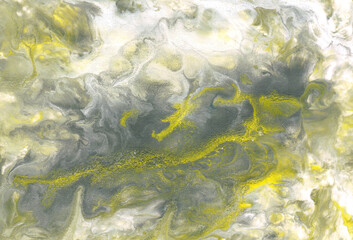 Beautiful fluid abstract paint background in trendy colors. Grey, yellow and white colors. Interior wallpaper. Marble texture. Liquid acrylic picture with artistic mixed paints. Fluid art background