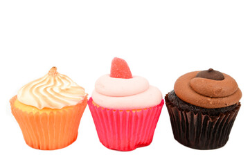 Chocolate, raspberry and lemon cupcakes arranged in a row