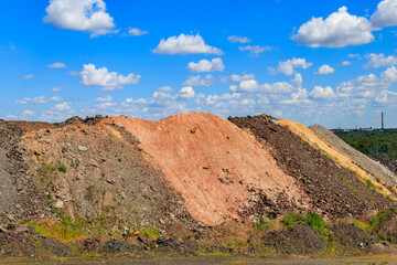 View of slag heaps of iron ore quarry. Mining industry