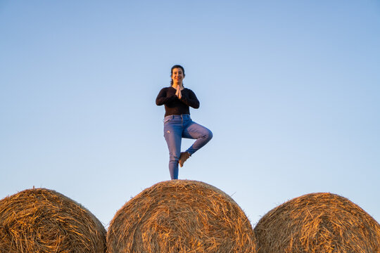 Cheerful, Pretty And Full Of Life Girl Enjoying A Photoshoot In The Straw