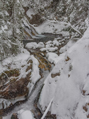Waterfall "Wodogrzmoty Mickiewicza" in winter scenery
