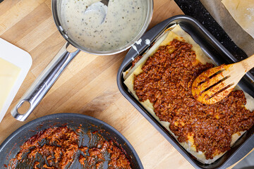 Preparation of Italian lasagne. Traditional Italian dish. View from above.