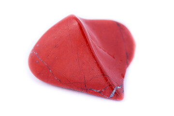 macro red jasper stone, close-up on a white background