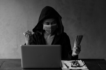 Young Asian hackers find personal information on the internet and use it to make money illegally