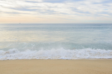 Set of pictures of a fantastic ocean wave in different stages. Cloudy sunrise sky. San Jose del Cabo. Mexico.