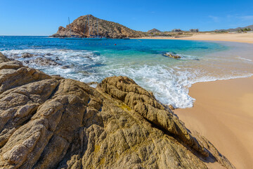 Santa Maria Beach, Cabo San Lucas, Mexico. Different stages of the fantastic ocean waves. Rocky and...