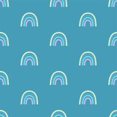 Colored baby seamless pattern with cute rainbows. Creative vector background for fabric, textile, baby wallpaper.