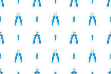 Tools seamless pattern. Background made of tools, pliers and an adjustable wrench.