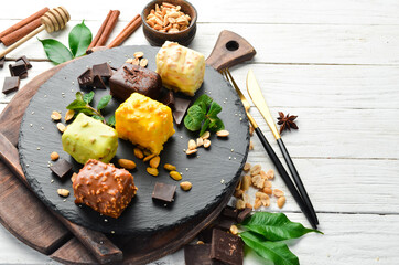 Set of colored cookies. Candy bar. Top view. Rustic style.