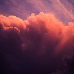 Pink and Purple Dreamy Fluffy Clouds During the Sun Set in the sky
